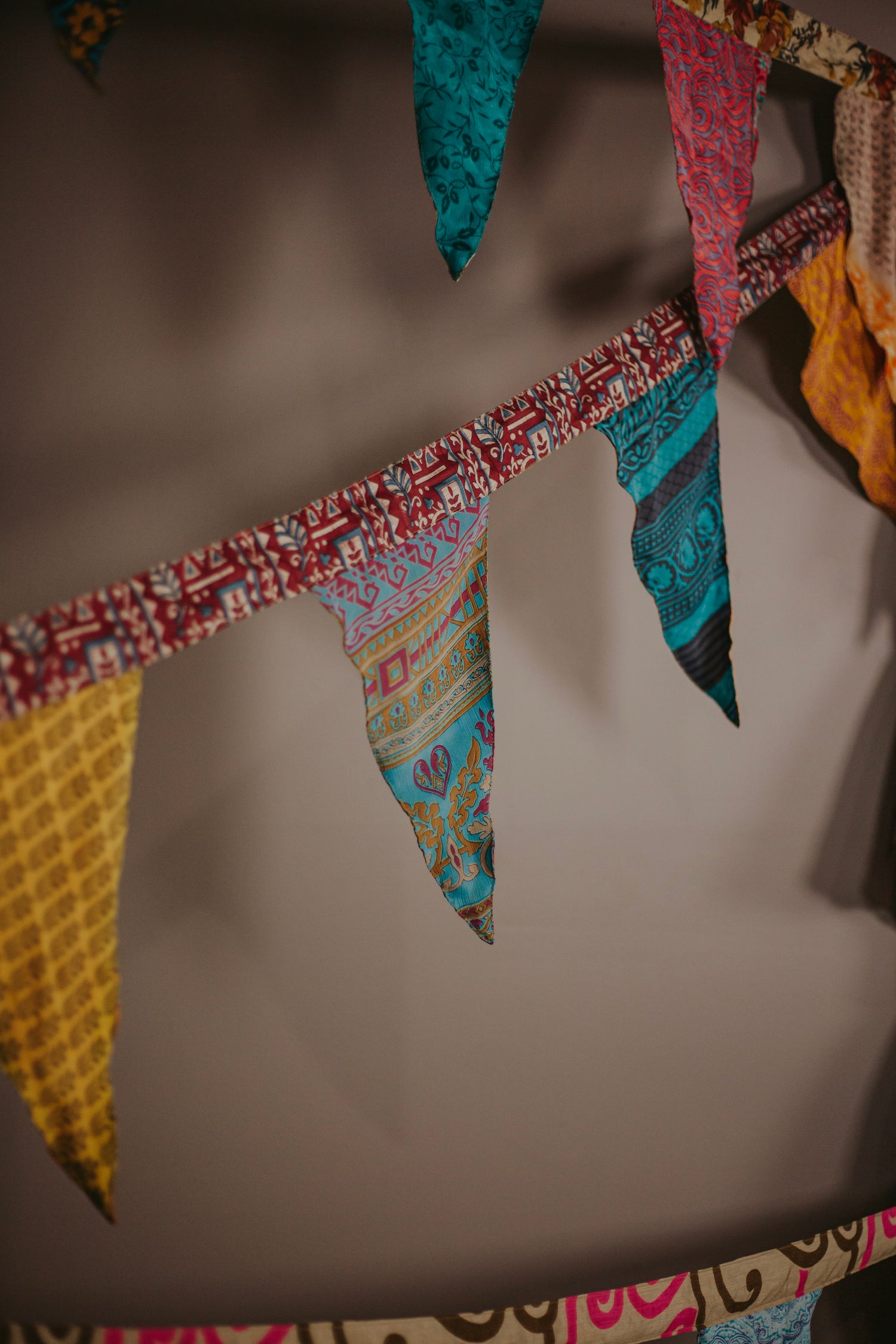 Multi-colored up-cycled sari bunting banner